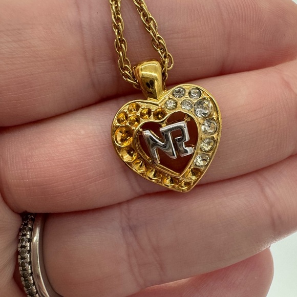 Nina Ricci Jewelry - Nina Ricci Gold and Silver Heart Necklace